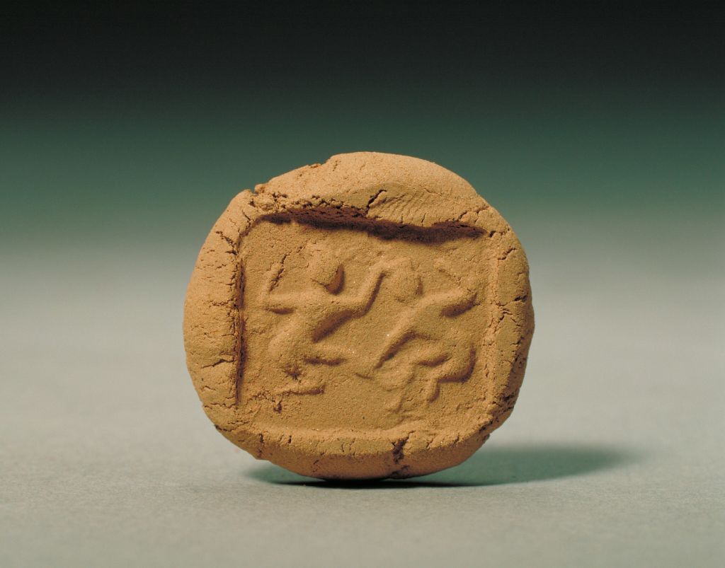 角觝图案铜印蜕印